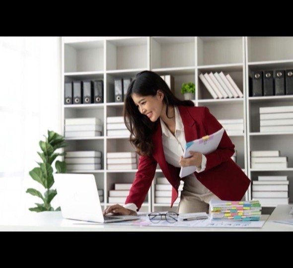 A professional organizing business documents.